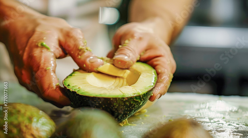 Person cutting avocado into pieces