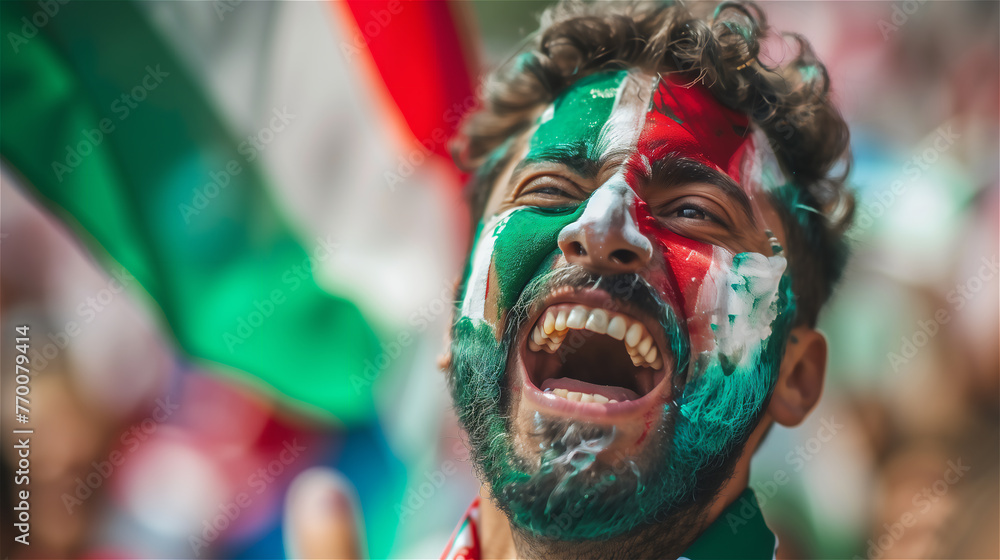 A cheerful fan of the national team with a cheering crowd in the background.