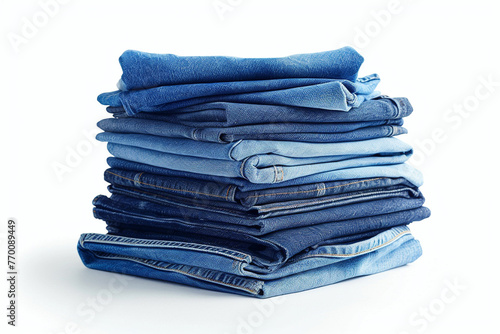 Stack of Various Shades Of Blue Jeans On White Background Denim jeans texture. Denim backgroundisolated on solid white background.