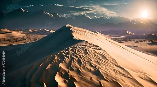 the sun is shining over a snowy mountain