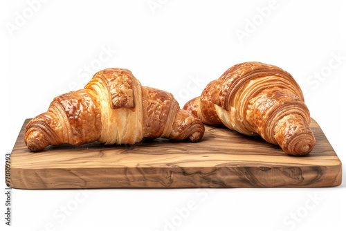 Two Croissants on Wooden Cutting Board