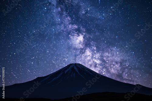Majestic Mountain Under Star-Filled Night Sky