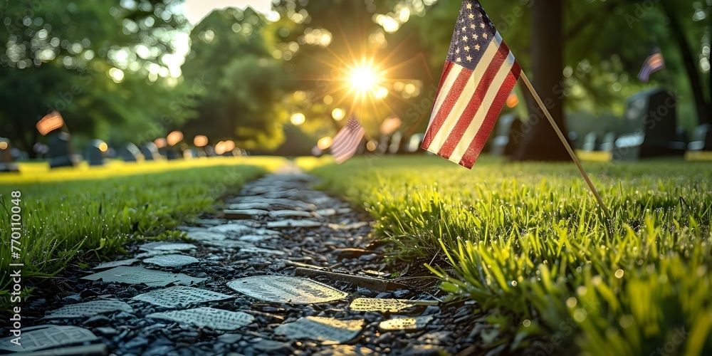 American flags adorn rows of white headstones in a military cemetery ...