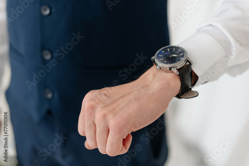 groom hand with watch