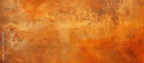 Close-up image showing the detail of a weathered and rusted wall with peeling brown and orange paint, creating a textured surface