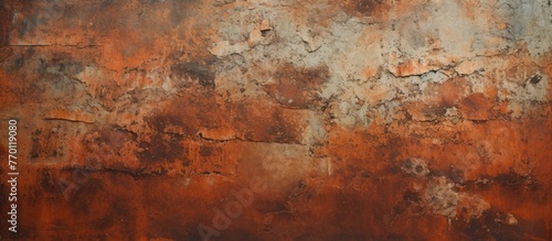Close-up view of a weathered wall covered in rust, featuring peeling red and white paint layers