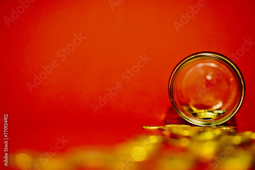 coins on a red rose background