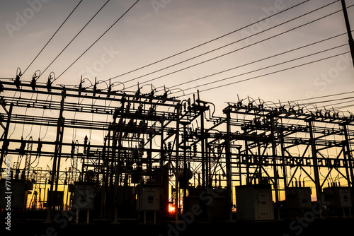 Silhouette of substation for the distribution of electric power with in Brazil, with sundown background