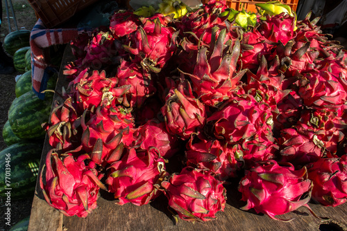 Red dragon fruit with red pulp. Hylocereus costaricensis, is on display at a street market in Brazil. Known Costa Rican night cactus, it is a species of cactus native to Central America.