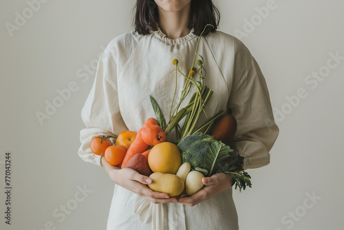 Anonymous person holds an abundant variety of fresh fruits and vegetables, showcasing a healthy diet selection. Generative AI photo