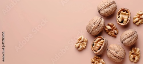 Assorted nuts on light brown backdrop with generous area for customizable text placement