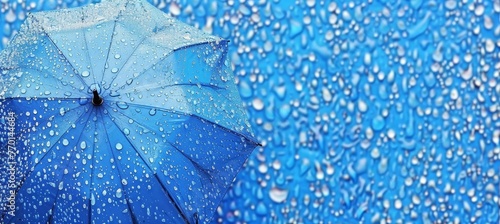 Umbrella shielded from raindrops with text space, rainy weather concept for creative messages