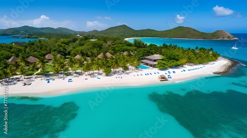 Aerial view of beautiful tropical island with white sand beach, turquoise water and palm trees.