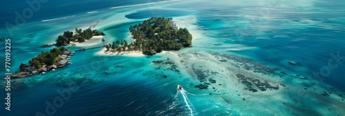 Aerial view of a tropical paradise island - A stunning high-angle shot of a breathtaking tropical island surrounded by clear blue waters and a boat leaving a wake, depicting luxury and escape photo