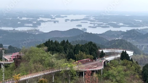 The panoramic view overlooking Chengdu, the Longquan Danjingtai eye-shaped platform offers a unique aerial view of lush landscapes, blending architecture with nature for a mesmerizing experience. photo