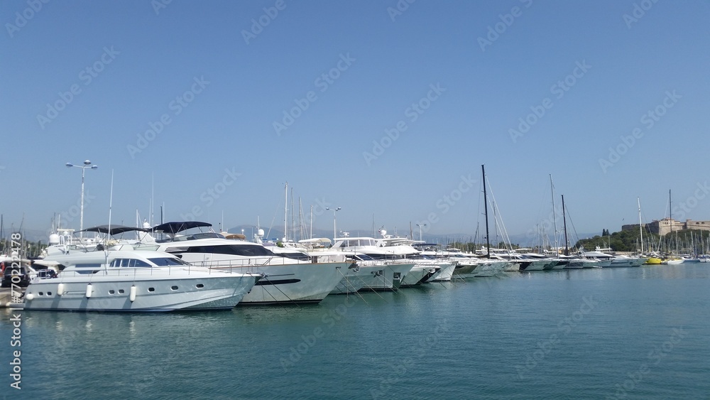 Moored boats in port Vauban with Fort Carre in Antibes, France