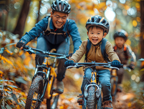 Happy moment captured as a father and his son ride their bikes through a forest with autumn leaves, both smiling joyfully