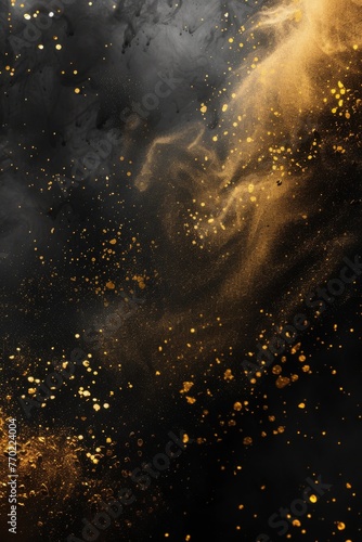 Golden dust and smoke on a black background