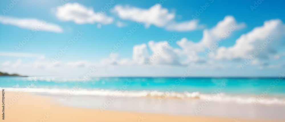 Abstract defocused background. Tropical summer beach with golden sand, turquoise ocean and blue sky with white clouds on bright sunny day. Summer holidays concept.