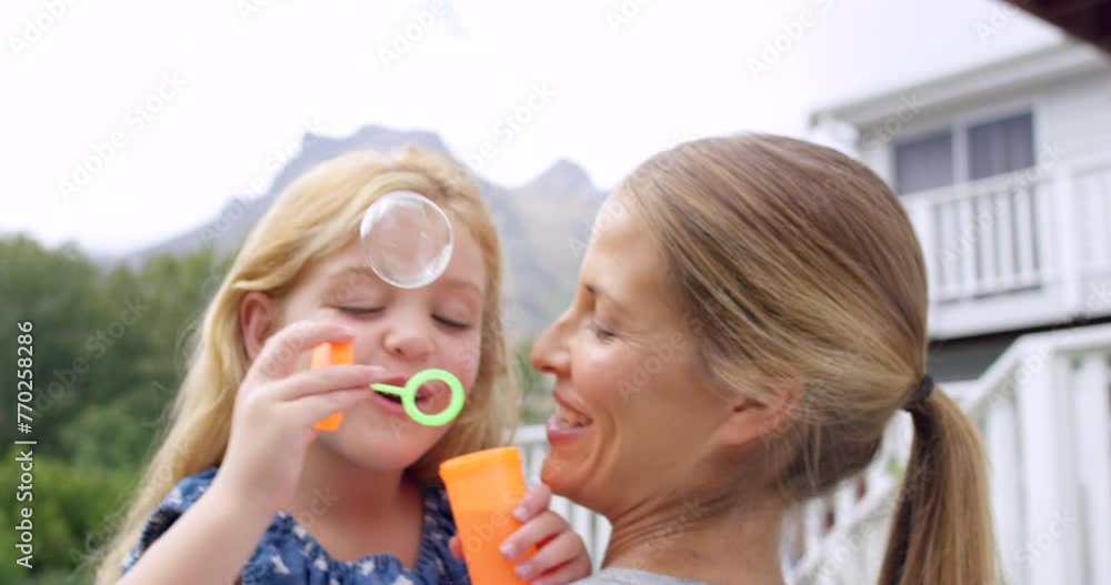 Child, game or mom blowing bubbles to play for fun outdoor freedom with support, care or love. Smile, happy parent or mother with a girl or kid in backyard to enjoy family bonding together in nature Child, game or mom blowing bubbles to play for fun outdoor freedom with support, care or love. Smile, happy parent or mother with a girl or kid in backyard to enjoy family bonding together in nature