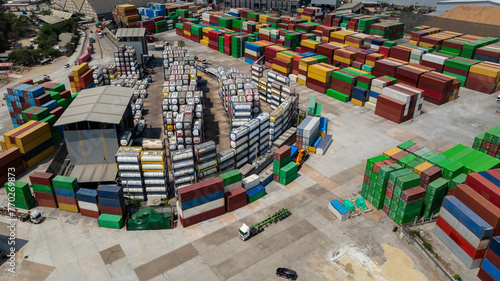 Warehouse, container goods at port cargo by the sea, Business and transporttation industry, by trailer and ship to distribute products to consumers and companies worldwide,