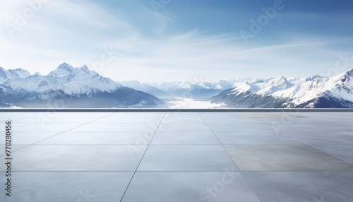 Square concrete floor with amazing winter snow mountain landscape © shahzaib