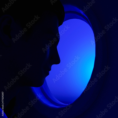 A man flies on an airplane and looks out the window. © sv_production