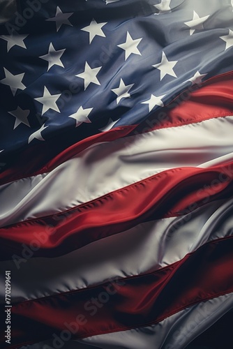 A red, white, and blue American flag with stars. The flag is waving in the wind