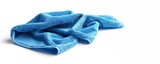 A crumpled blue microfiber cloth isolated on a white background.