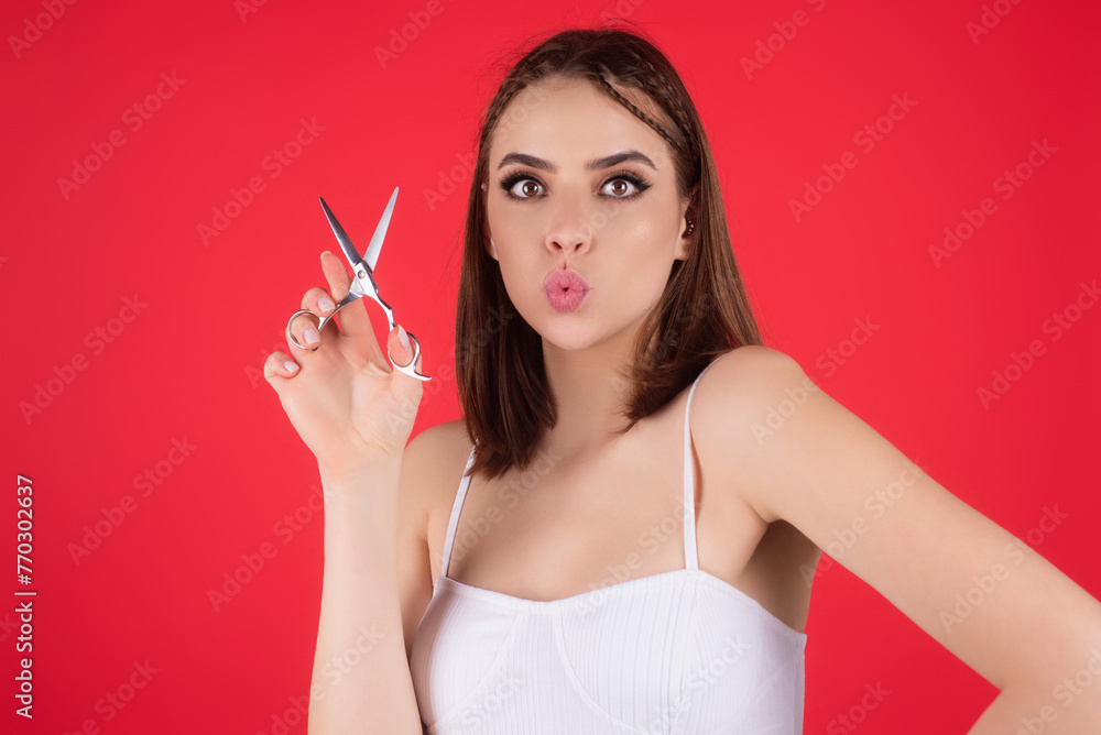 Woman hairdresser cutting hair with a scissors. Woman hairdresser cutting hair with a scissors.