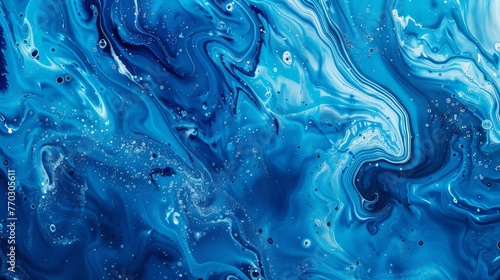 The background of an abstract painting is blue with a liquid texture.