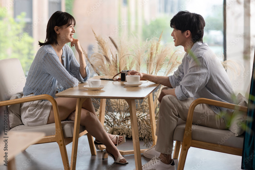 Young couple dating in caf�� Young couple dating in caf��