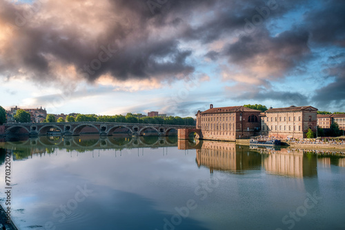 Toulouse is the capital of the Occitania region in southern France. It is divided by the Garonne River and is located near the border with Spain. It is known as La Ville Rose photo