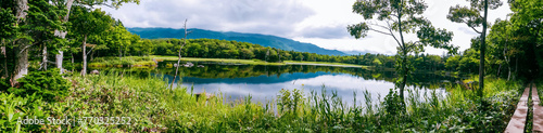 Fotografie A panoramic view in late summer over the Sanko (third) lake of Shiretoko Goko Lakes in Shiretoko National Park, a UNESCO World Natural Heritage site in Hokkaido of Japan