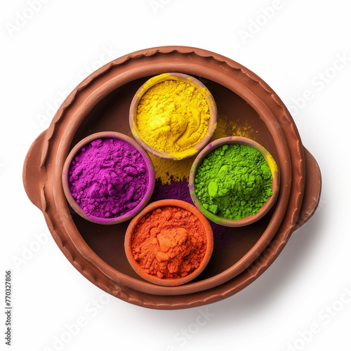 Holi festival Colorful gulaal. Holi colors or powder in traditional pot isolated on white background. Top view