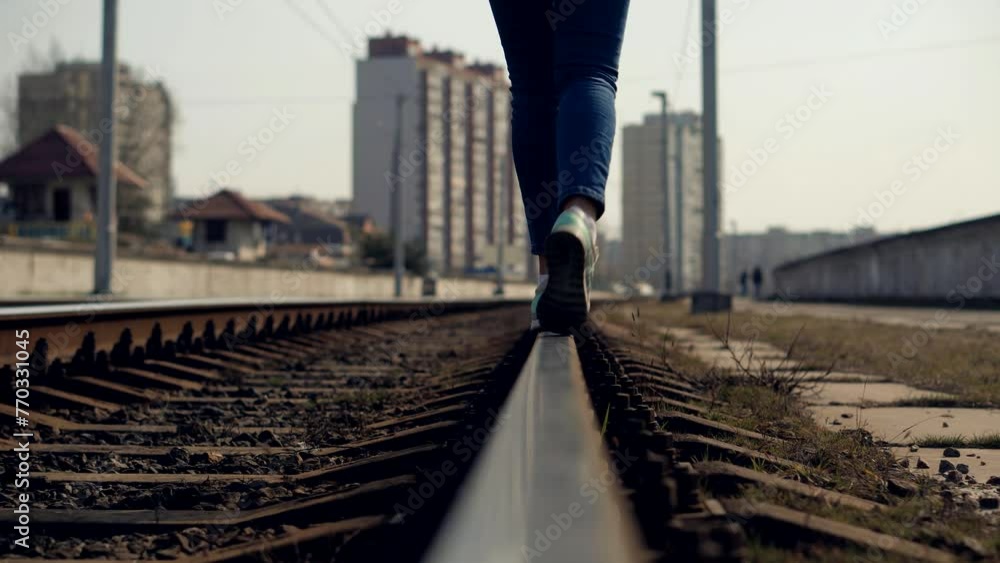 Happy dreamer on old railroad rail . Rust on steel railroad rail	