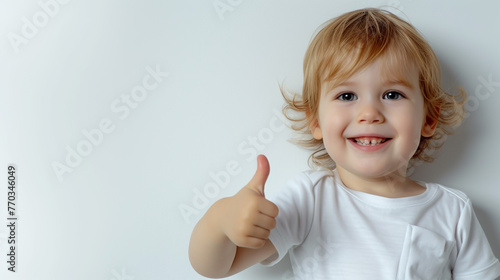 A photo of a happy child giving the thumbs up