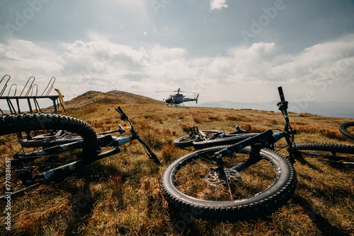 Thrilling Helicopter Rides and E-Bike Escapades on the Mountain photo