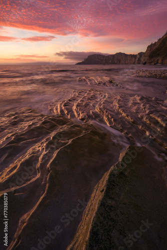 Smooth Rocks and Ocean Cliffs at Sunrise photo