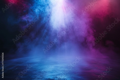 Abstract dark background, a spotlight illuminated the asphalt floor with colorful smoke and fog in a studio room. Empty scene for product presentation. In the style of a night club stage 