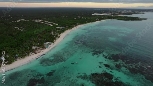 Aerial view of Xpuha Beach with turquoise water and greenery photo