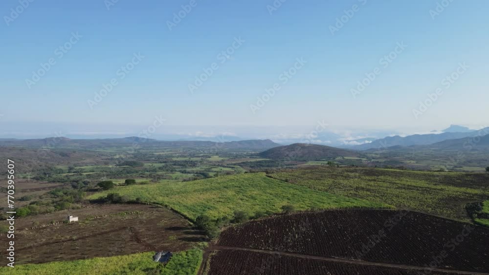 Aerial view of Huge valley with crop fields. Tepic, Nayarit, Mexico Aerial view of Huge valley with crop fields. Tepic, Nayarit, Mexico