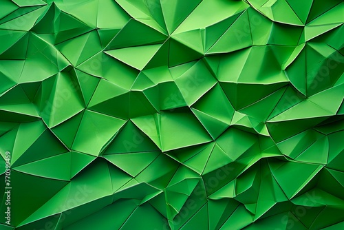 Abstract geometric background of green triangles