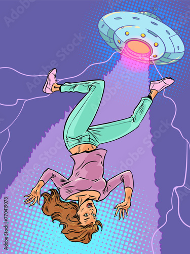 Pop Art Retro A woman is lifted up on a beam by a cosmic saucer. Alien invasion and abduction of earth. Exploration of other life in the universe.