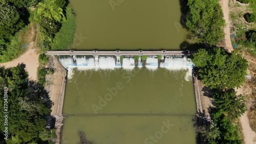 Aerial view of spillway over a small dam in rural Thailand. photo