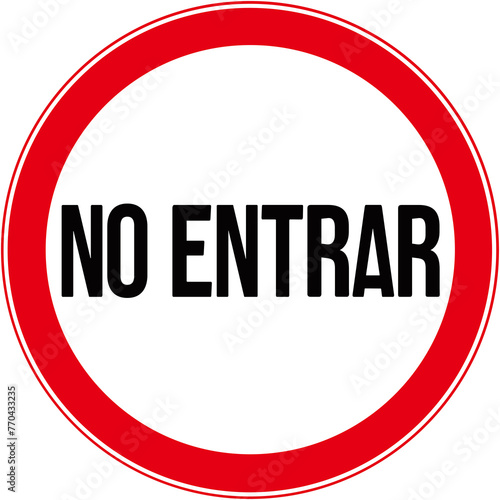 a circular sign that says in Spanish: do not enter photo