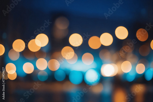 City blurring lights abstract circular bokeh on blue background photo