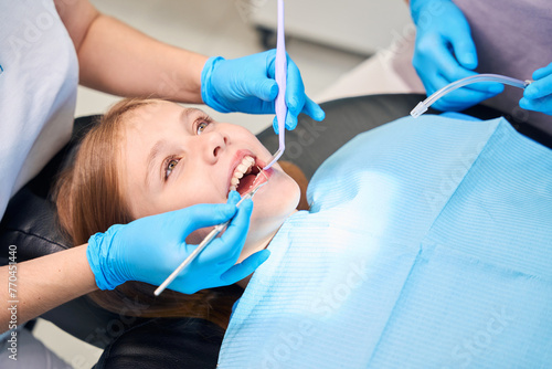 Young female patient in the dentists chair