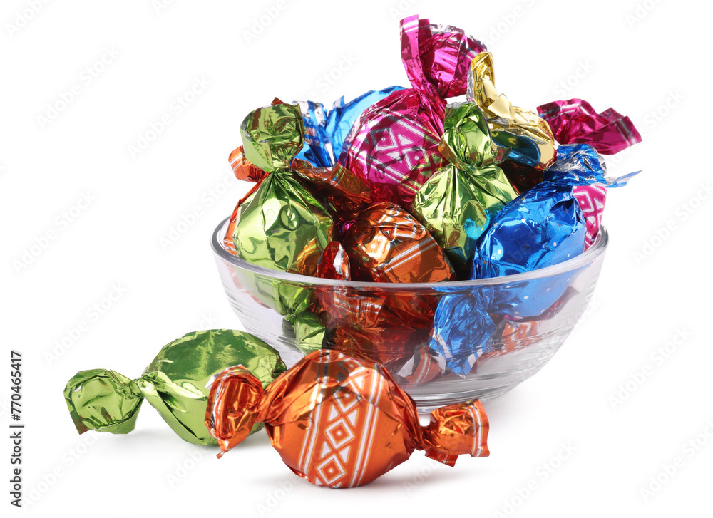 Bowl with candies in colorful wrappers isolated on white - obrazy, fototapety, plakaty 