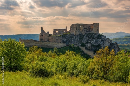 Medieval castle Beckov with surrounding landscape on a spring sunny day, Slovakia, Europe. Discover the history of European castles © Ivan